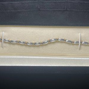 1 CT. T.W. Diamond Fashion "X" Bracelet in 10K Two-Tone Gold